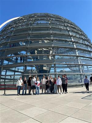 students pose near a structure in Germany